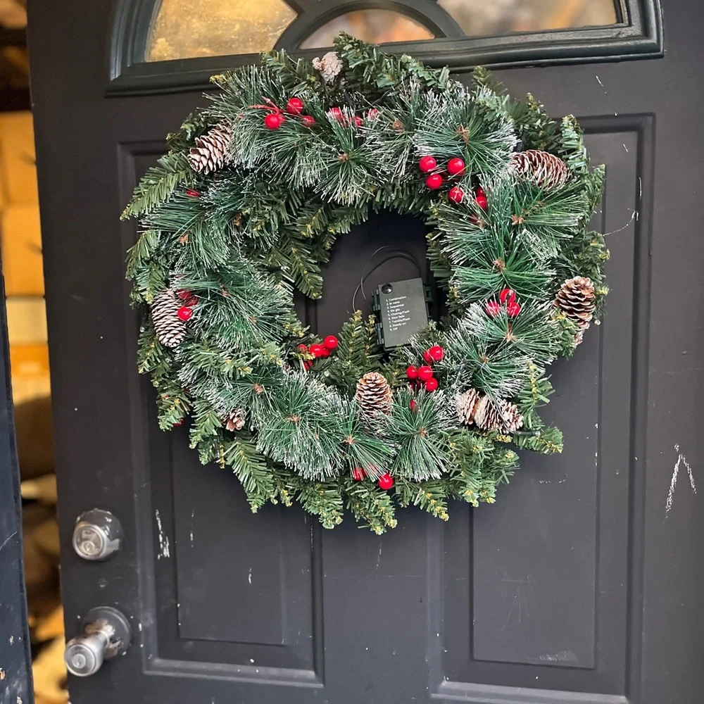 Festive Green Holiday Wreath with Red Accents